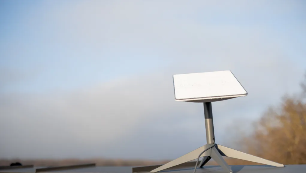 Starlink satellite dish on roof of residential building